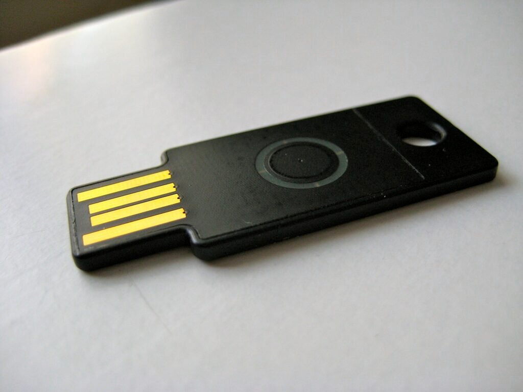 A black YubiKey hardware security key used for two-factor authentication