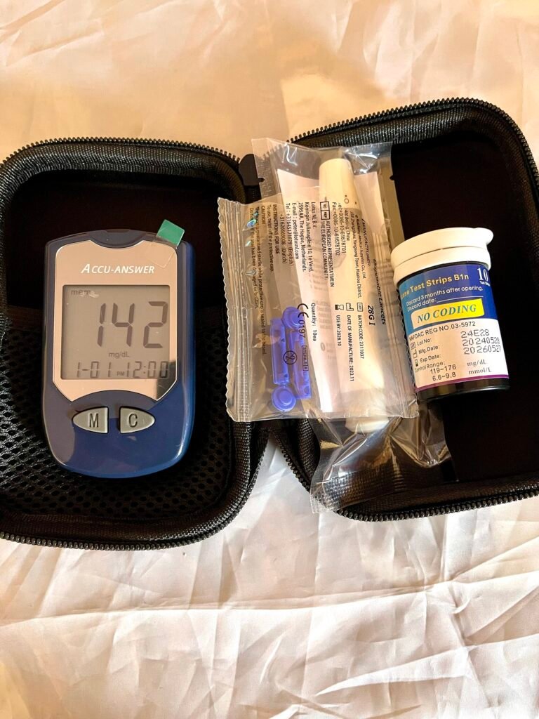 A blood glucose monitoring kit with a glucometer, test strips, lancets and a lancing device