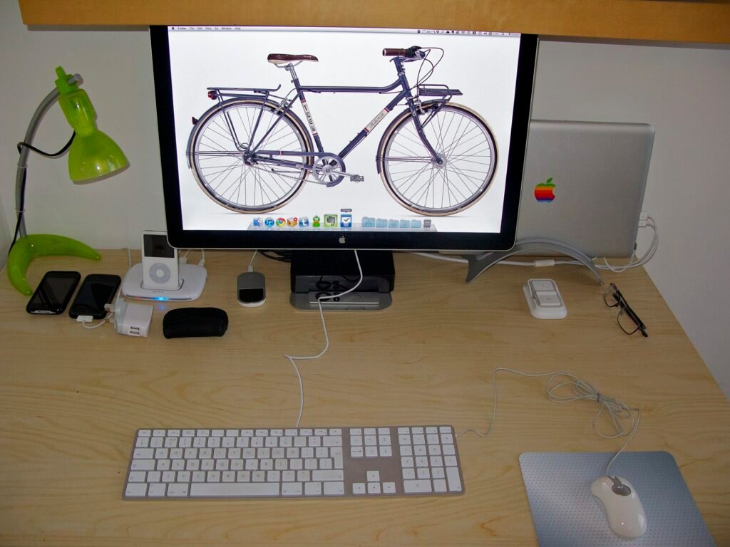 A home desk with a laptop and external monitor set up for remote work