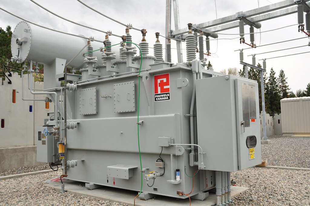 A large outdoor power transformer at an electrical substation