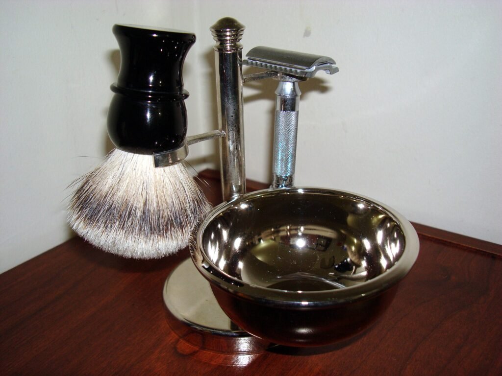 A men's shaving kit with razor, brush and bowl