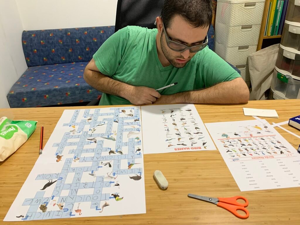 A partly filled paper crossword puzzle