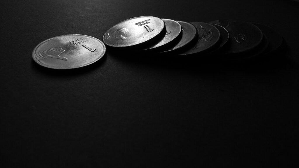 A pile of Indian one-rupee coins