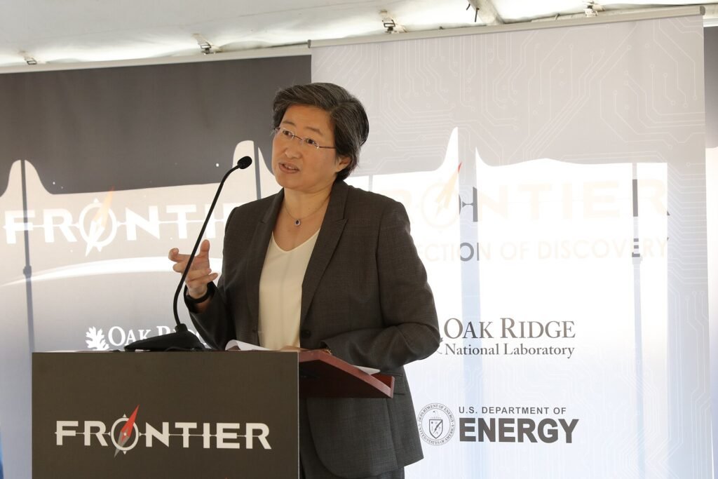 AMD CEO Lisa Su speaking at a lectern at Oak Ridge National Laboratory