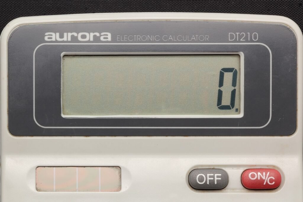 Close-up of an electronic calculator with an eight-digit display