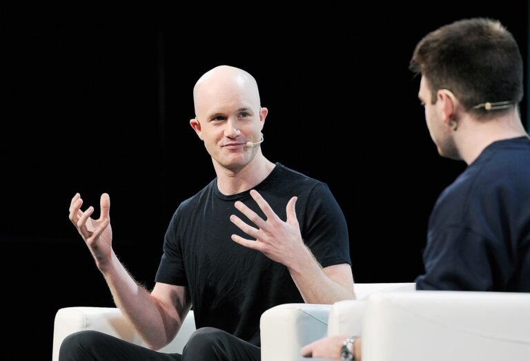 Coinbase CEO Brian Armstrong speaking on stage at TechCrunch Disrupt 2018