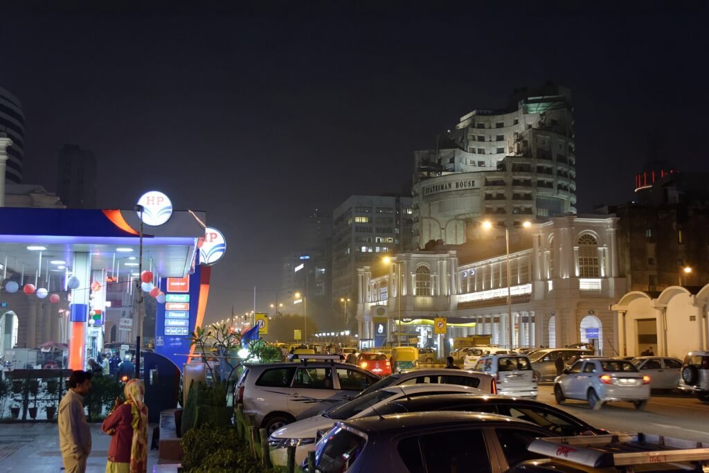Colonnaded white buildings of Connaught Place in New Delhi lit up at night
