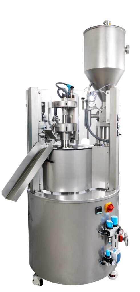 Stainless steel semi-automatic tube filling machine with a product hopper on top