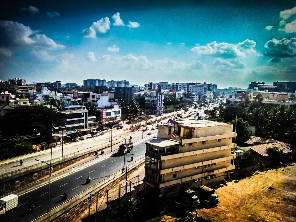 View over Bengaluru's Outer Ring Road with office buildings and traffic